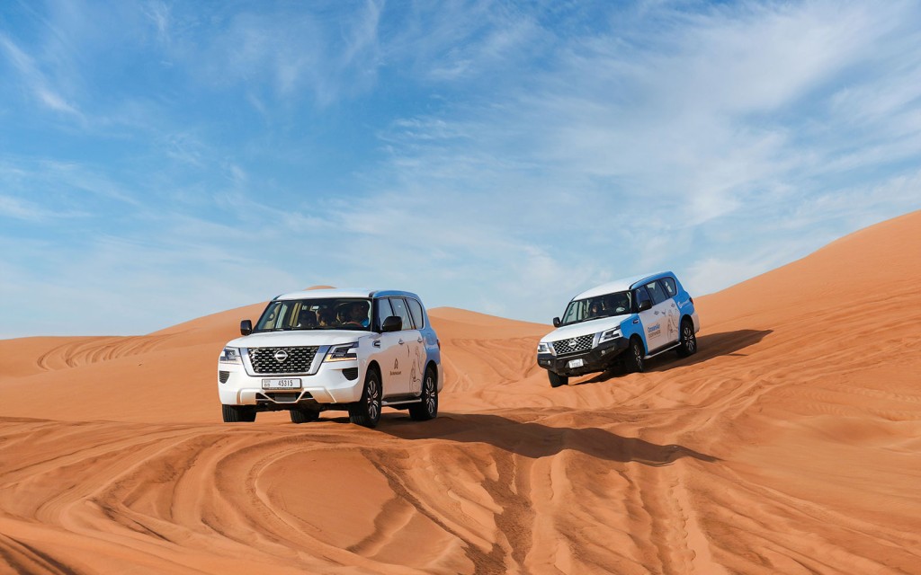 Abu Dhabi Premium Desert Safari with BBQ Dinner, Camel Ride and Sandboarding (Private Safari (Up to 6 Guests))