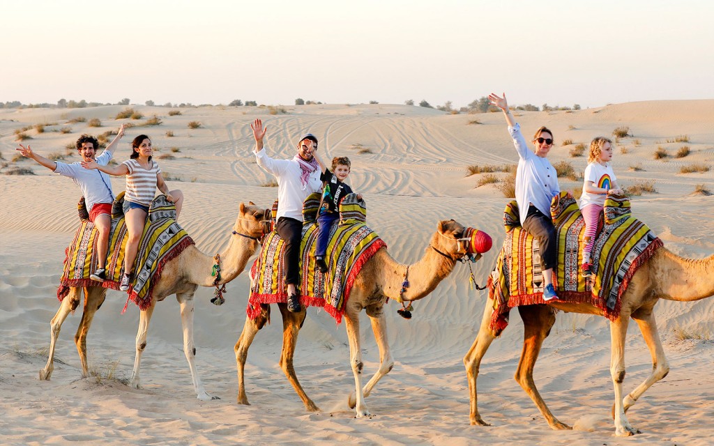 Abu Dhabi Premium Desert Safari with BBQ Dinner, Camel Ride and Sandboarding (Shared Safari) - 1