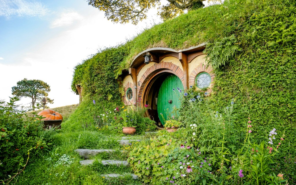 Z Auckland: Wycieczka z przewodnikiem po planie filmowym Hobbiton z opcjonalnym świątecznym lunchem (Small Group Tour) - 1