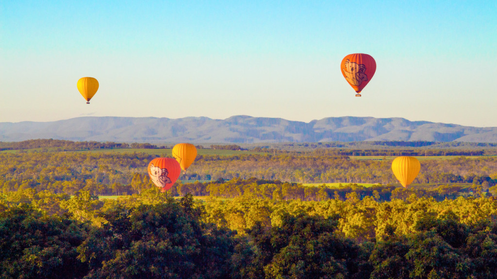 Sunrise Hot Air Balloon Flight near Cairns with Sparkling Wine and Optional Round Trip Transfer (Sunrise Hot Air Balloon Flight with Round Trip Transfer + Sparkling Wine + FREE Digital Photos and Bad Fishy Jet Boating Experience) - 2